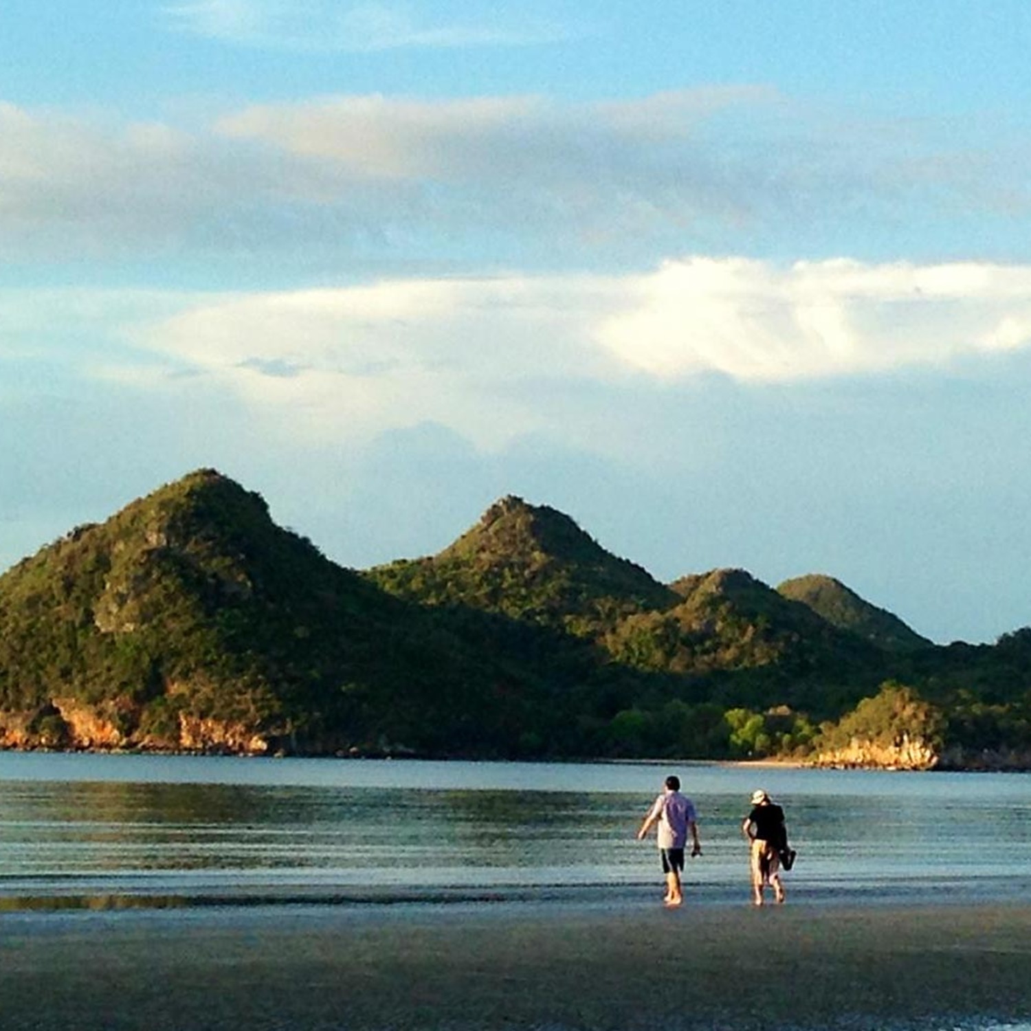 Coastal scenery at Ao Manao, a curved bay framed by two mountains near Lyndale Lodge